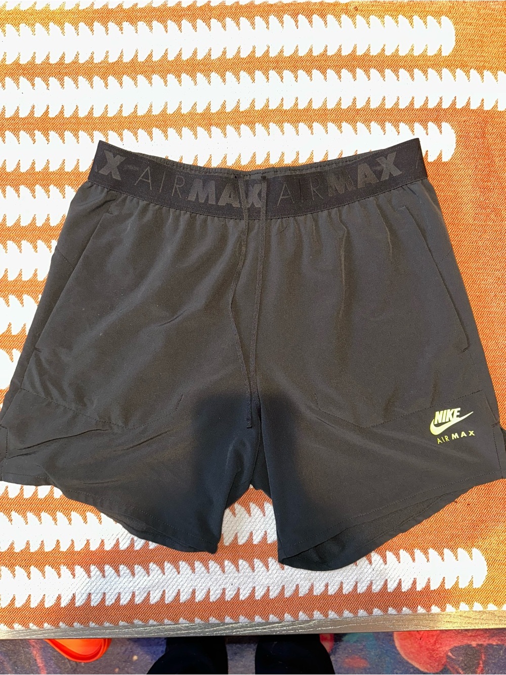 Nike Black Athletic Shorts with Yellow Swoosh